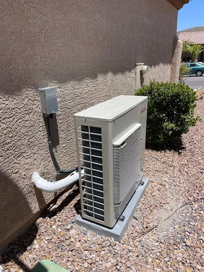 Residential air conditioning condenser unit in West View